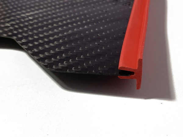 Fin rails from TheFishFinBlades, showcasing a sturdy, streamlined design crafted to enhance the performance and stability of carbon fiber fins. The rails feature a sleek finish, designed for optimal attachment and support, ensuring improved control during underwater movement.